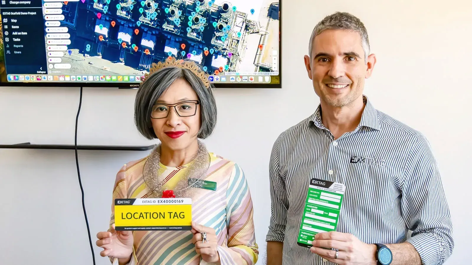 Lan Tran, CSO of EXTAG and Gabe Alves, CTO of EXTAG, holding up EXTAG Tags at A Future By Design Conference in Perth, Western Australia