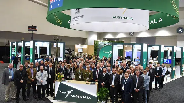 Team Defence Australian delegation standing in a group at AUSA 2024 in Washington DC USA