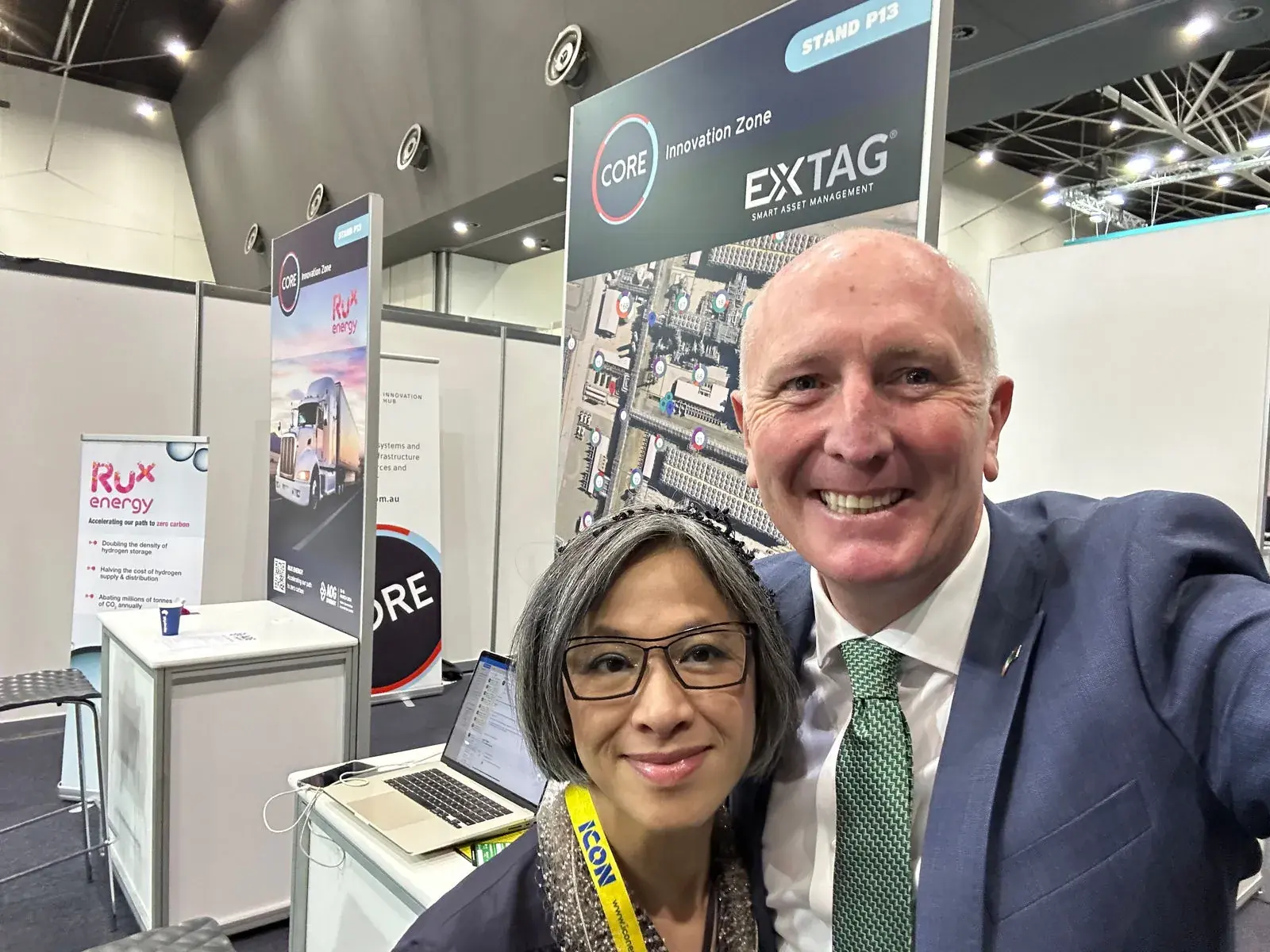 Minister Stephen Dawson taking a selfie with Lan Tran, EXTAG CSO, at the AOG Energy Expo at the CORE Innovation Hub booth.