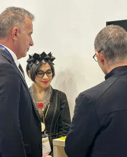 Paul Papalia talking with Lan Tran and Gabe Alves from EXTAG Custom Asset Management at the 2024 Land Forces Exhibition